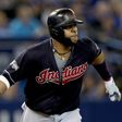 Carlos Santana of the Cleveland Indians hits a solo home run in the third inning against the Toronto Blue Jays during game five of the American League Championship Series