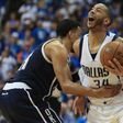 Devin Harris of the Dallas Mavericks is fouled by Andre Roberson of the Oklahoma City Thunder during game four of the Western Conference Quarterfinals of the 2016 NBA Playoffs at American Airlines Center on April 23, 2016 in Dallas, Texas
