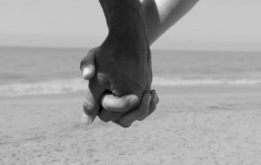 Couple holding hands