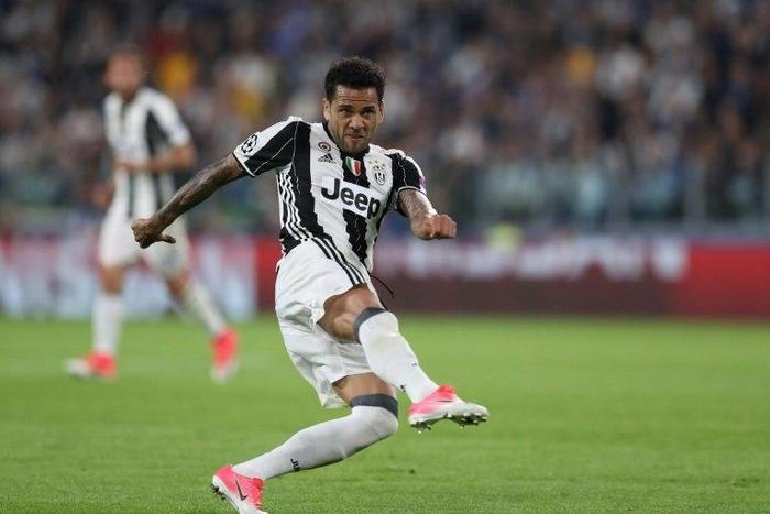 Juventus Defender Dani Alves kicks to score during the UEFA Champions League semi final second leg football match Juventus vs Monaco, on May 9, 2017
