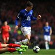 Everton's midfielder Ross Barkley (R) vies with Liverpool's midfielder Emre Can during the English Premier League football match between Liverpool and Everton at Anfield in Liverpool, north west England on April 1, 2017