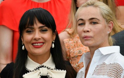 US-Mexican actress Salma Hayek (L) and French actress Emmanuelle Beart pose on May 23, 2017 during a photocall for the '70th Anniversary' of the Cannes Film Festival