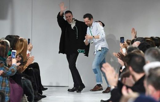 Designers Raf Simons (L) and Pieter Mulier walk the runway at the Calvin Klein show at New York Fashion Week on February 10, 2017