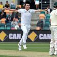 South Africa paceman Kyle Abbott (L) celebrates his wicket of Australia batsman Adam Voges (R) in Hobart on November 15, 2016