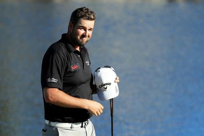 Marc Leishman of Australia celebrates on the 18th green after finishing 11 under to win during the final round of the Arnold Palmer Invitational on March 19, 2017 in Orlando, Florida