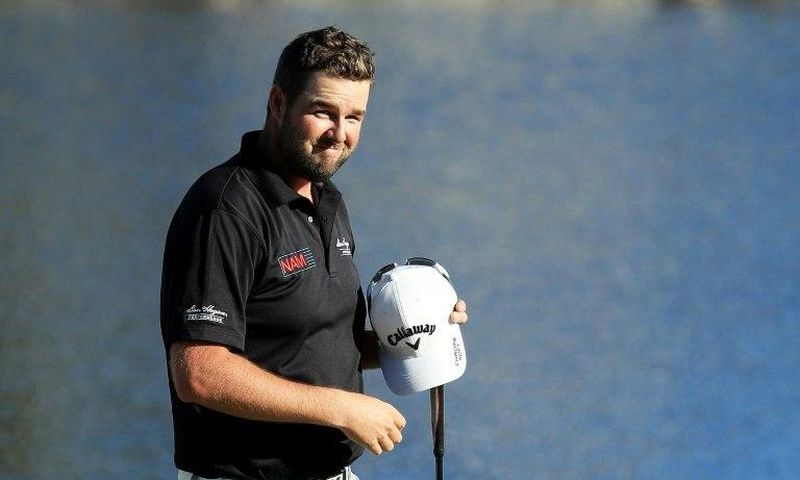 Marc Leishman of Australia celebrates on the 18th green after finishing 11 under to win during the final round of the Arnold Palmer Invitational on March 19, 2017 in Orlando, Florida