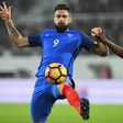 France's forward Olivier Giroud (L) vies with Ivory Coast's defender Wilfried Kanon during a friendly football match on November 15, 2016 at the Bollaert stadium in Lens