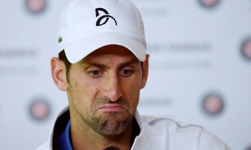 Serbia's Novak Djokovic speaks to the press after his straight-sets defeat to Austria's Dominic Thiem in the French Open quarter-finals on June 7, 2017