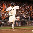 Brandon Crawford of the San Francisco Giants celebrates as he heads home to score the game winning run in the 13th inning against the Chicago Cubs on October 10, 2016 in San Francisco, California