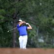 Jason Day of Australia plays a shot on the 15th hole at Augusta National Golf Club