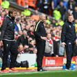Everton manager Ronald Koeman (far right) looks at his Liverpool counterpart Jurgen Klopp during the Merseyside derby at Anfield in north-west England, on April 1, 2017