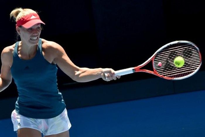Angelique Kerber of Germany hits a return during a practice session ahead of the Australian Open tennis tournament in Melbourne on January 15, 2017