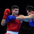 Great Britain's Josh Kelly (L) fights Kazakhstan's Daniyar Yeleussinov during the Men's Welter (69kg) match at the Rio 2016 Olympic Games August 11, 2016