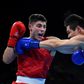 Great Britain's Josh Kelly (L) fights Kazakhstan's Daniyar Yeleussinov during the Men's Welter (69kg) match at the Rio 2016 Olympic Games August 11, 2016