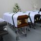 Coffins of members of the Brazilian football team Chapecoense Real the were killed in a plane crash in the Colombian mountains, are seen at the San Vicente mortuary in Medellin on December 1, 2016