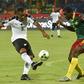 Ghana's forward Jordan Ayew (L) challenges Cameroon's defender Michael Ngadeu-Ngadjui during the 2017 Africa Cup of Nations semi-final football match between Cameroon and Ghana in Franceville on February 2, 2017
