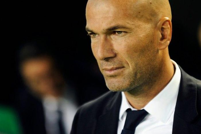 Real Madrid's French coach Zinedine Zidane waits before the Spanish league football match Real Betis vs Real Madrid CF at the Benito Villamarin stadium in Sevilla on October 15, 2016