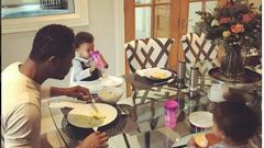 John Mikel Obi and his twin daughters