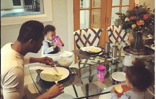 John Mikel Obi and his twin daughters