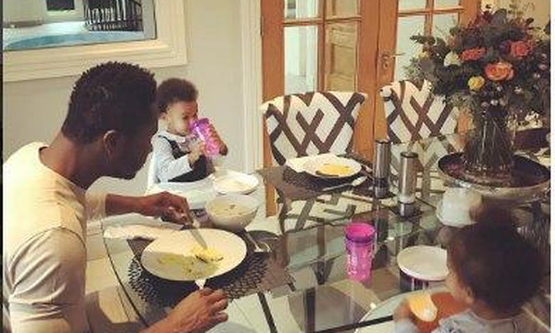 John Mikel Obi and his twin daughters