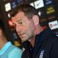 Andreas Samaris (L) rejoins the Greek national football team in the line up announced by head coach Michael Skibbe (R) tain Andreas Samaris (L) attend a press conference in Sydney on June 3, 2016.Australia play Greece in a double-header football intern...