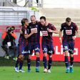 Eibar's defender Ivan Ramis (2nd L) celebrrates with teammates after scoring on October 30, 2016