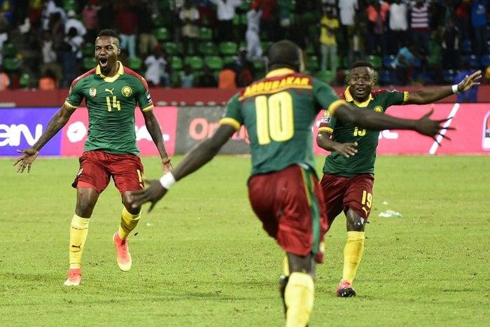 Cameroon's players celebrate after winning the penalty shootout at the end of their 2017 Africa Cup of Nations quarter-final match against Senegal, in Franceville, on January 28, 2017