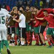 Ivory Coast players watch as Moroccan players celebrate at the end of their 2017 Africa Cup of Nations match on January 24, 2017