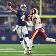 Dak Prescott of the Dallas Cowboys rolls out to pass during the fourth quarter against the Washington Redskins at AT&T Stadium