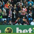 Charlie Austin (left) celebrates after scoring Southampton's opening goal against Burnley at St Mary's Stadium in Southampton on October 16, 2016