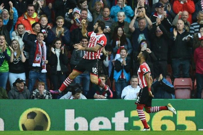 Charlie Austin (left) celebrates after scoring Southampton's opening goal against Burnley at St Mary's Stadium in Southampton on October 16, 2016
