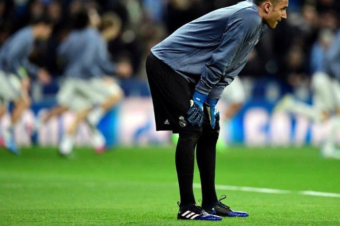 Real Madrid's goalkeeper Keylor Navas warms up ahead of an UEFA Champions League match in Madrid, on February 15, 2017