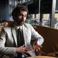 Former Sevilla French football player Julien Escude gestures during an AFP interview in Madrid on February 13, 2016
