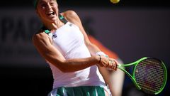Latvia's Jelena Ostapenko returns the ball to Romania's Simona Halep during their final match at the Roland Garros 2017 French Open on June 10, 2017 in Paris