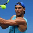 Rafael Nadal of Spain hits a backhand return during a practice session ahead of the Australian Open, in Melbourne, on January 14, 2017