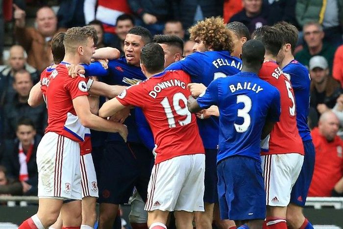 Middlesbrough and Manchester United players clash towards the end of their English Premier League match, at Riverside Stadium in Middlesbrough, on March 19, 2017