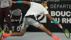 Australia's Nick Kyrgios returns the ball to Slovakia's Norbert Gombos during their ATP Marseille Open tennis match in Marseille, southern France, on February 24, 2017