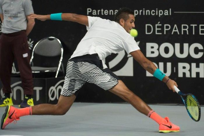 Australia's Nick Kyrgios returns the ball to Slovakia's Norbert Gombos during their ATP Marseille Open tennis match in Marseille, southern France, on February 24, 2017