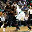 The Celtics, comprehensively beaten by the Cavaliers earlier in the week, slid to another costly defeat as Paul Millsap (L) inspired Atlanta to a 123-116 win