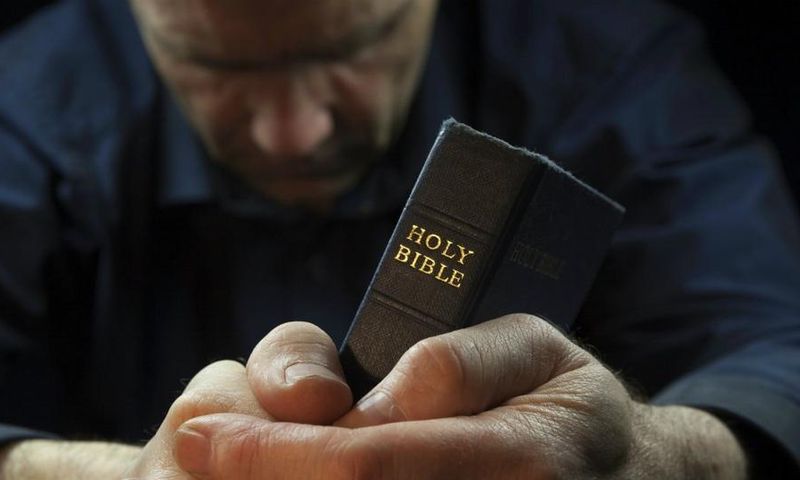 Man praying [file photo]