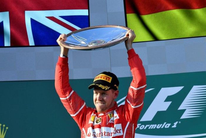 Ferrari's Sebastian Vettel celebrates his victory in the Australian Grand Prix on March 26, 2017