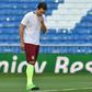 Bayern Munich's defender Mats Hummels looks down and wipes his face during a training session at the Santiago Bernabeu stadium in Madrid in Madrid on April 17, 2017
