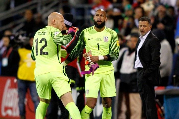The US national football team goalkeeper Tim Howard (R) leaves the field as Brad Guzan takes his place during their 2018 FIFA World Cup qualifying match against Mexico, in Columbus, Ohio, on November 11, 2016