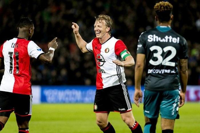 Dirk Kuyt of Feyenoord Rotterdam celebrates the 3-0 score with his teammates during the Dutch Eredivisie soccer match in Rotterdam on April 5, 2017