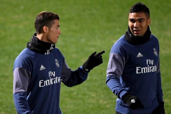 Real Madrid forward Cristiano Ronaldo (left) and midfielder Casemiro train in Yokohama on December 16, 2016