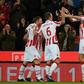 Stoke City's striker Peter Crouch (R) celebrates with teammates after scoring his team's first goal during the English Premier League football match against Everton February 1, 2017