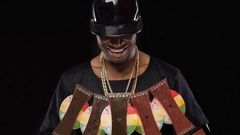 EL flaunts his plaques