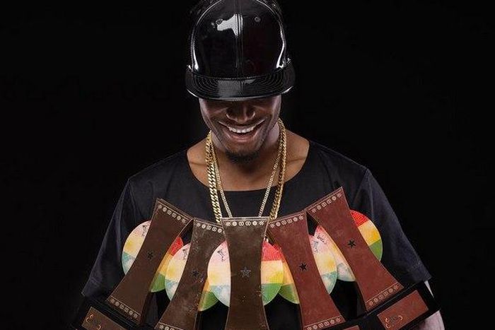 EL flaunts his plaques