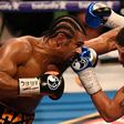 British boxers David Haye (left) and Tony Bellew exchange blows during their heavyweight bout at the O2 arena in London, on March 4, 2017
