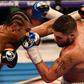 British boxers David Haye (left) and Tony Bellew exchange blows during their heavyweight bout at the O2 arena in London, on March 4, 2017